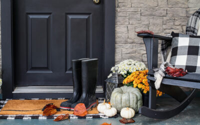 fall porch monochromatic grey, black and white with blanket and boots